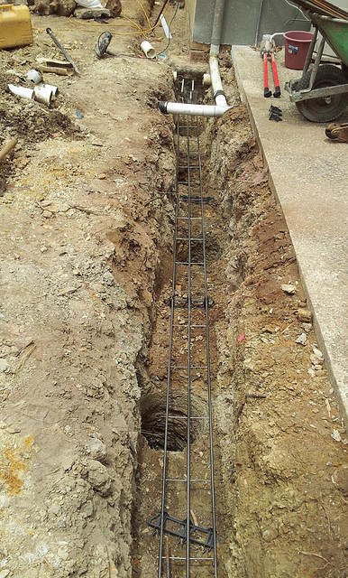 Footings with pier holes and steel